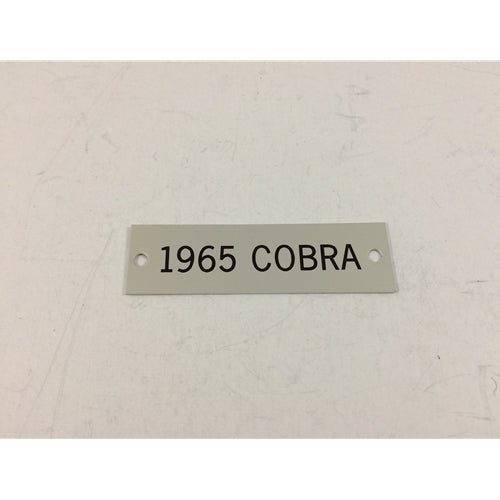 Emblem Foot Box "1965 Cobra Tag"